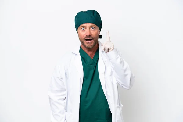 Middle Age Surgeon Green Uniform Isolated White Background Thinking Idea — Φωτογραφία Αρχείου