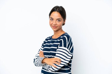 Young hispanic woman isolated on white background with arms crossed and looking forward