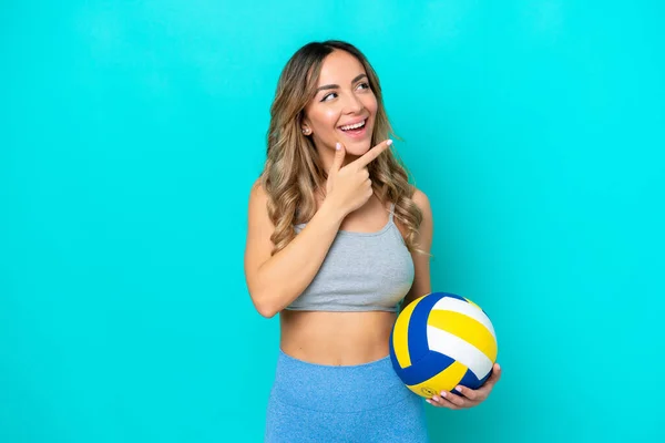 Young Caucasian Woman Playing Volleyball Isolated Blue Background Happy Smiling — Stockfoto