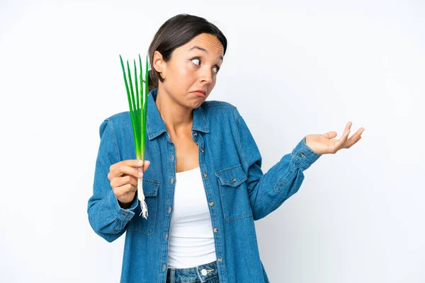Young Hispanic Woman Holding Chive Isolated White Background Surprise Expression — Stockfoto