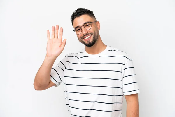 Young Arab Handsome Man Isolated White Background Saluting Hand Happy — Zdjęcie stockowe