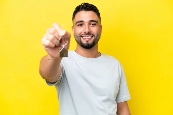 Young Arab Man Holding Home Keys Isolated Yellow Background Happy — Stock fotografie