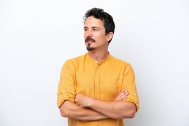 Young man with moustache isolated on white background looking to the side