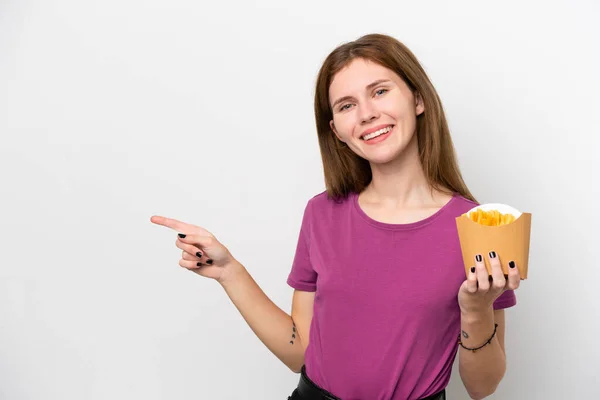 Young English Woman Holding Fried Chips Isolated White Background Pointing — Photo