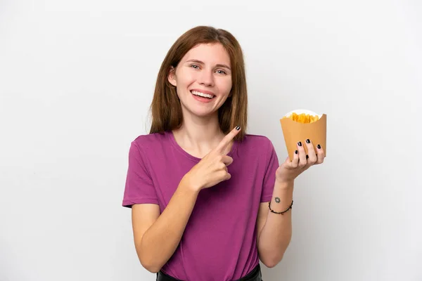 Young English Woman Holding Fried Chips Isolated White Background Pointing — Fotografia de Stock