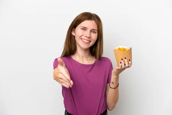 Young English Woman Holding Fried Chips Isolated White Background Shaking — стоковое фото