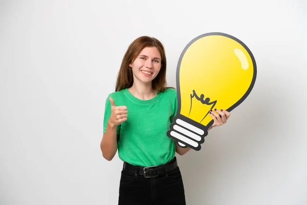 Young English Woman Isolated White Background Holding Bulb Icon Thumb — Zdjęcie stockowe