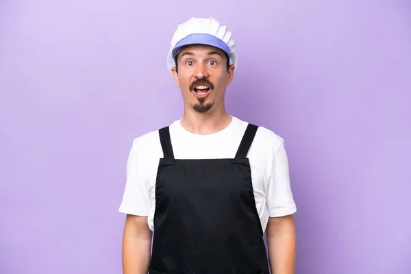 Fishmonger Man Wearing Apron Isolated Purple Background Surprise Facial Expression — Foto de Stock