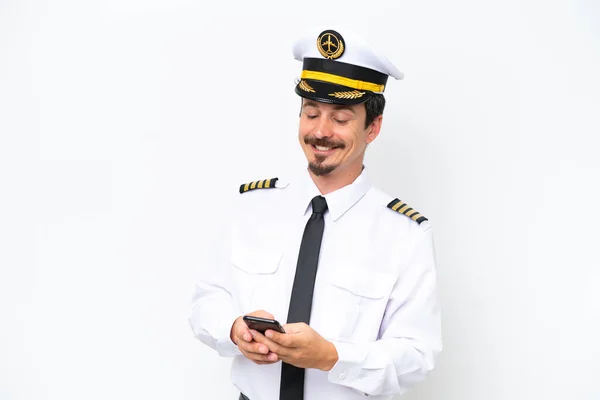 Airplane Caucasian Pilot Isolated White Background Sending Message Mobile — Stockfoto