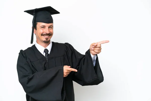 Young University Graduate Man Isolated White Background Pointing Finger Side — Stockfoto