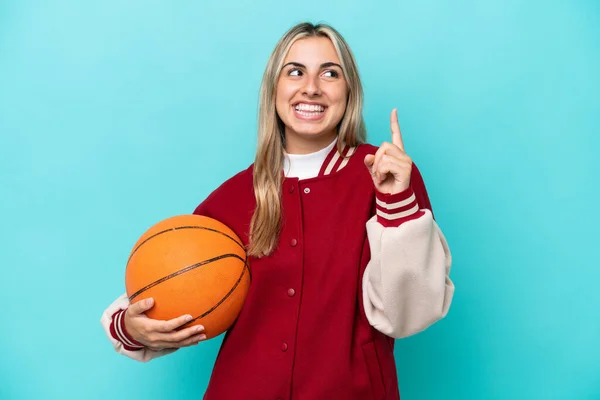 Mladý Kavkazský Basketbalista Žena Izolované Modrém Pozadí Ukazuje Skvělý Nápad — Stock fotografie