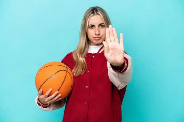 Young Caucasian Basketball Player Woman Isolated Blue Background Making Stop — Stock fotografie