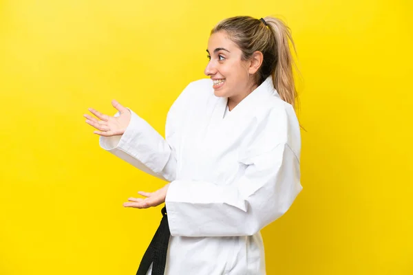 Young Caucasian Woman Doing Karate Isolated Yellow Background Surprise Expression — Fotografia de Stock