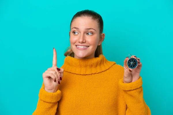 Young Caucasian Woman Holding Compass Isolated Blue Background Intending Realizes — Stockfoto