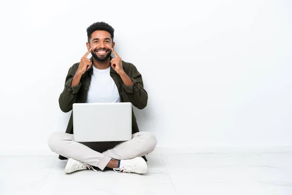 Young Brazilian Man Laptop Sitting Floor Isolated White Smiling Happy — 图库照片