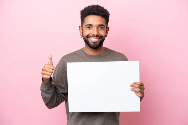 Young Brazilian Man Isolated Pink Background Holding Empty Placard Thumb — Φωτογραφία Αρχείου