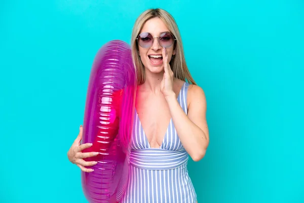 Blonde Woman Swimsuit Holding Air Mattress Donut Isolated Blue Background — 스톡 사진
