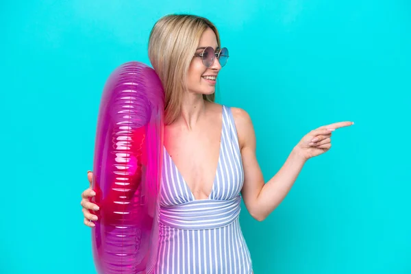 Blonde Woman Swimsuit Holding Air Mattress Donut Isolated Blue Background — ストック写真