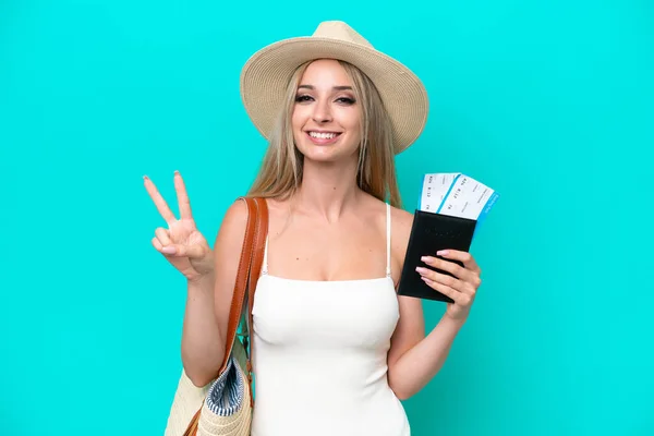 Blonde Woman Swimsuit Holding Passport Isolated Blue Background Smiling Showing — Foto de Stock