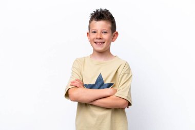 Little caucasian boy isolated on white background keeping the arms crossed in frontal position