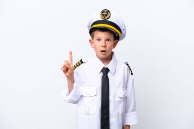 Little airplane pilot boy isolated on white background thinking an idea pointing the finger up