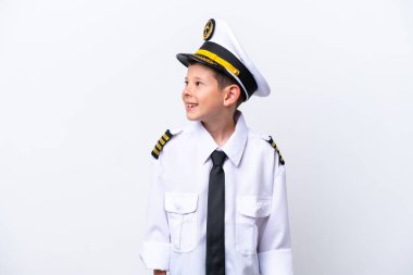 Little airplane pilot boy isolated on white background looking side