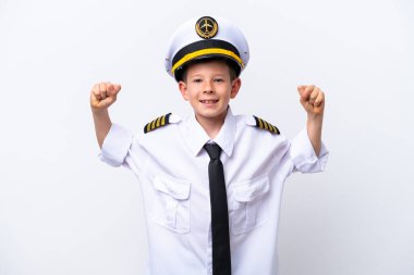 Little airplane pilot boy isolated on white background doing strong gesture
