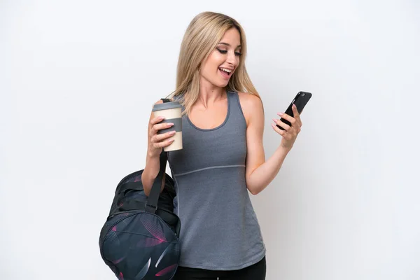 Young Sport Woman Sport Bag Isolated White Background Holding Coffee — Stok fotoğraf