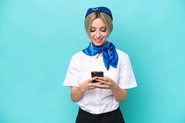 Airplane Blonde Stewardess Woman Isolated Blue Background Sending Message Mobile — Photo
