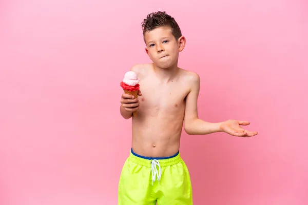 Little Caucasian Boy Eating Ice Cream Isolated Pink Background Making — стоковое фото