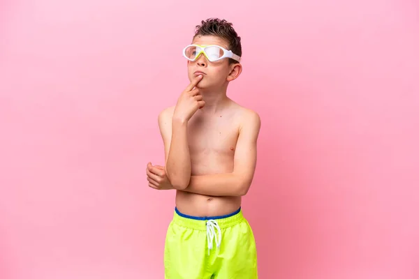 Little Caucasian Boy Wearing Diving Goggles Isolated Pink Background Having — 스톡 사진