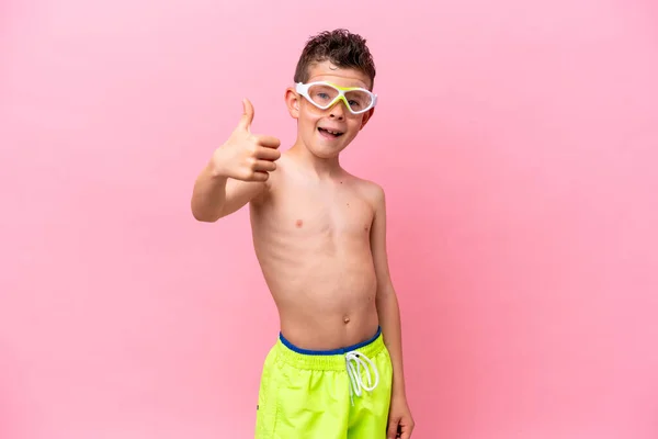 Little Caucasian Boy Wearing Diving Goggles Isolated Pink Background Thumbs — Φωτογραφία Αρχείου