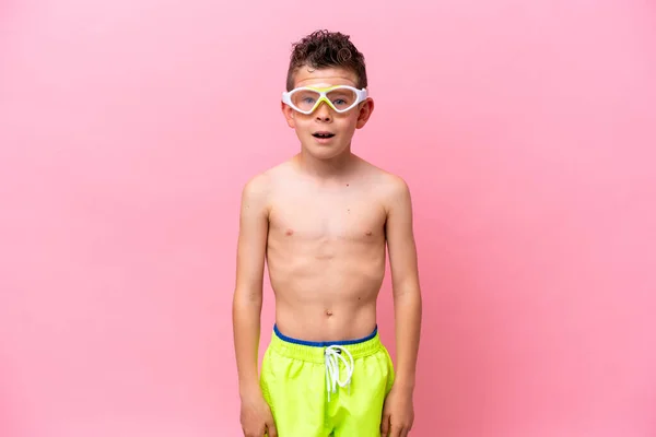 Little Caucasian Boy Wearing Diving Goggles Isolated Pink Background Surprise — Photo