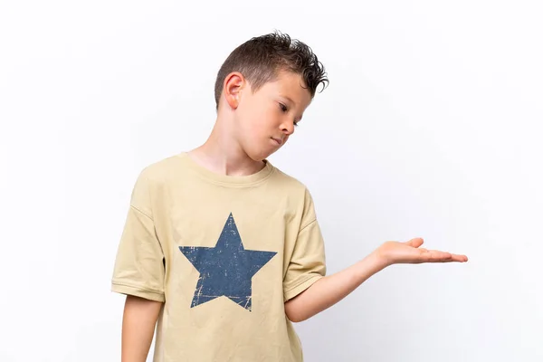 Little Caucasian Boy Isolated White Background Holding Copyspace Doubts — 图库照片