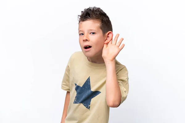Little Caucasian Boy Isolated White Background Listening Something Putting Hand —  Fotos de Stock