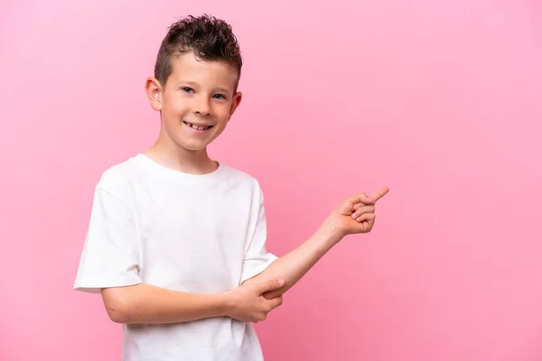 Little Caucasian Boy Isolated Pink Background Pointing Finger Side — Photo