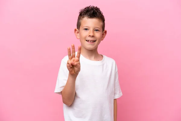Little Caucasian Boy Isolated Pink Background Happy Counting Three Fingers — 图库照片