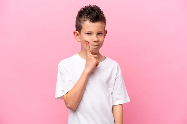 Little Caucasian Boy Isolated Pink Background Thinking — Φωτογραφία Αρχείου