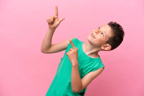 Little Caucasian Boy Isolated Pink Background Pointing Index Finger Great — Fotografia de Stock