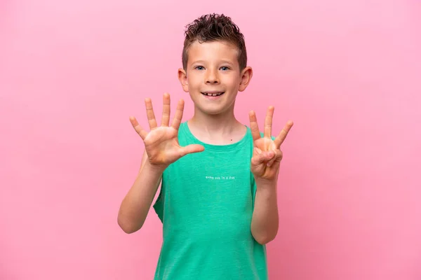 Little Caucasian Boy Isolated Pink Background Counting Eight Fingers — 图库照片