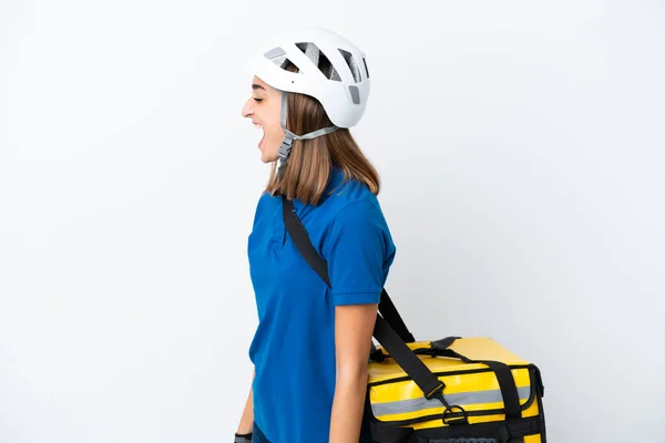 Young Caucasian Woman Thermal Backpack Isolated White Background Laughing Lateral — Stock Photo, Image