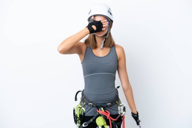 Young rock-climber woman isolated on white background covering eyes by hands. Do not want to see something