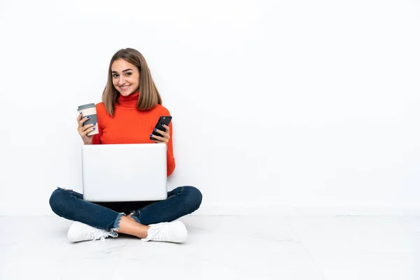 Young Caucasian Woman Sitting Floor Laptop Holding Coffee Take Away — Stockfoto
