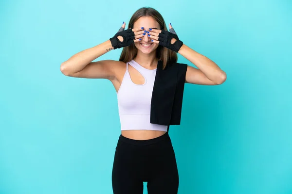 Young Sport Woman Isolated Blue Background Covering Eyes Hands — Stockfoto