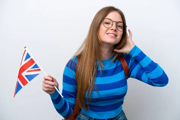 Mladá Běloška Drží Vlajku Spojeného Království Izolovanou Bílém Pozadí Něco — Stock fotografie