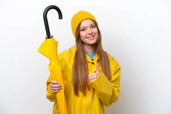 Young Caucasian Woman Rainproof Coat Umbrella Isolated White Background Giving — ストック写真