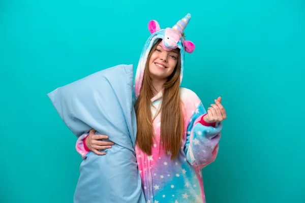 Young Caucasian Girl Unicorn Pajamas Holding Pillow Isolated Blue Background — Foto de Stock