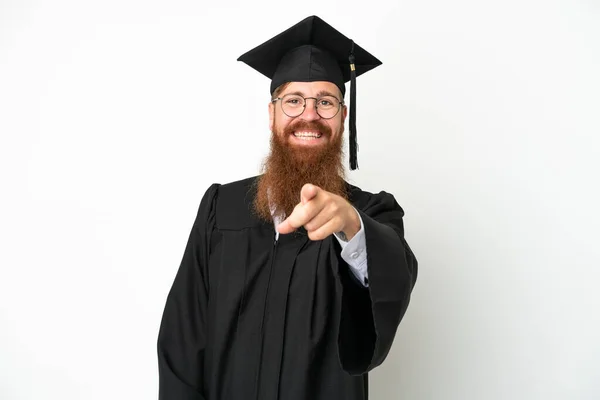 Young University Graduate Reddish Man Isolated White Background Surprised Pointing — стоковое фото