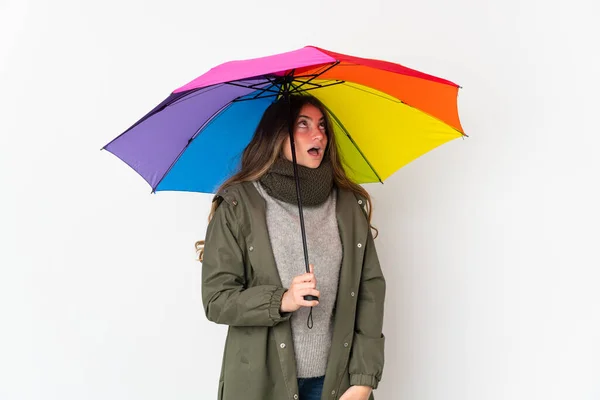 Young Caucasian Woman Holding Umbrella Isolated White Background Looking Surprised — Foto de Stock