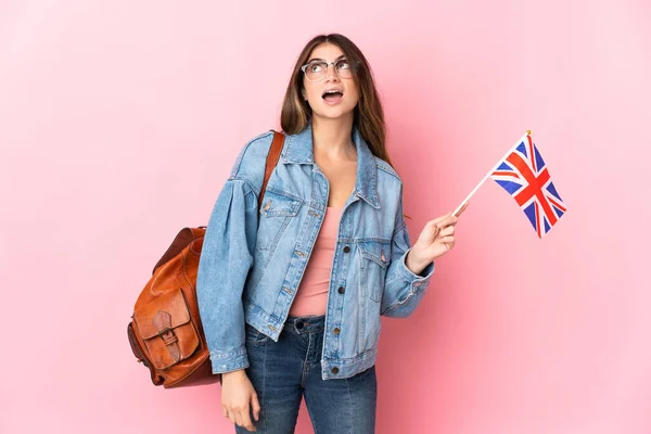 Young Woman Holding United Kingdom Flag Isolated Pink Background Looking — Stok fotoğraf